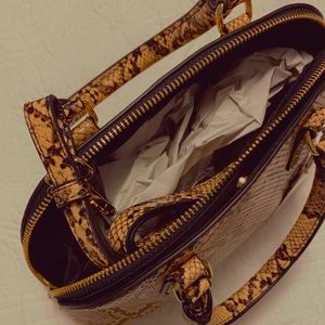 Small snake pattern purse